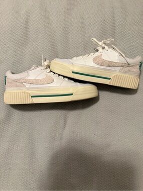Nike women’s Court Legacy Low-Top Sneakers in White Stadium Green color way